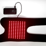 96-LED red light therapy knee wrap flat lay - dual wavelength 660nm and 850nm LEDs active with USB-C power bank
